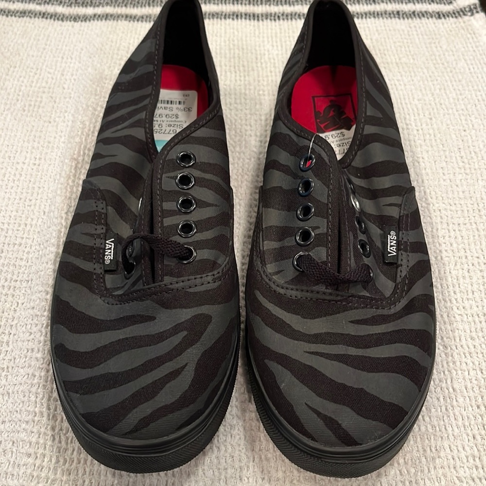 Women’s Low Top Vans- NWT. Black and grey Zebra Print. Size 9.5